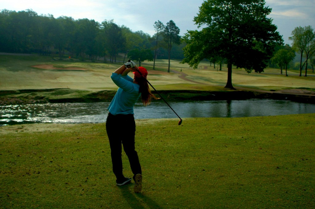 State Champ Natasha Chapman, our on-staff Golf Pro, demonstrates how to get over the river and onto the 10th green at Cherokee Village North Course.