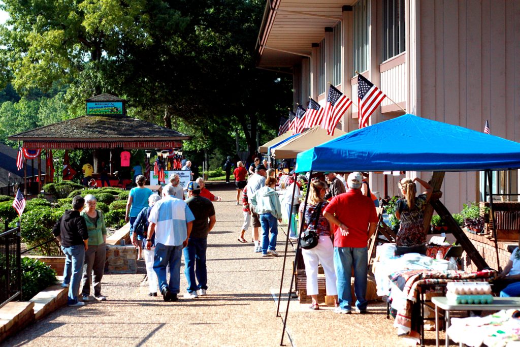 Folks shop and visit at the Farmer's Market located at Town Center in Cherokee Village.
